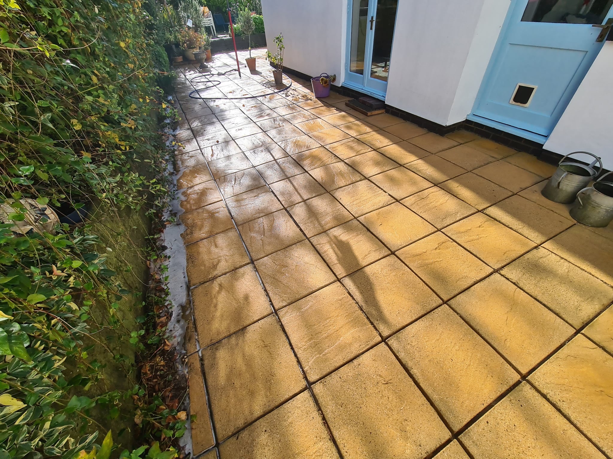 Patio transformation after professional cleaning